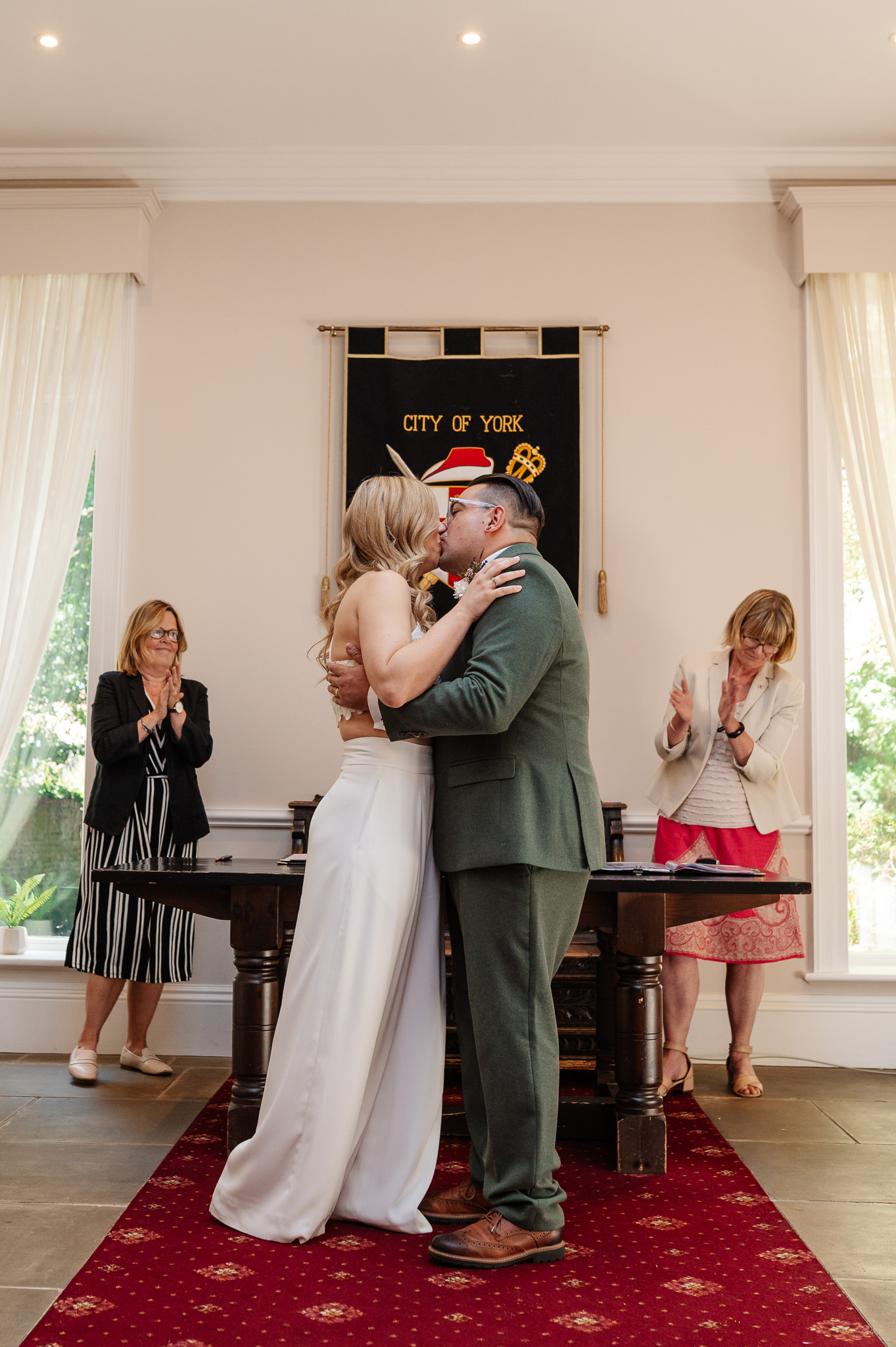 first kiss with bride and groom at york registry office 