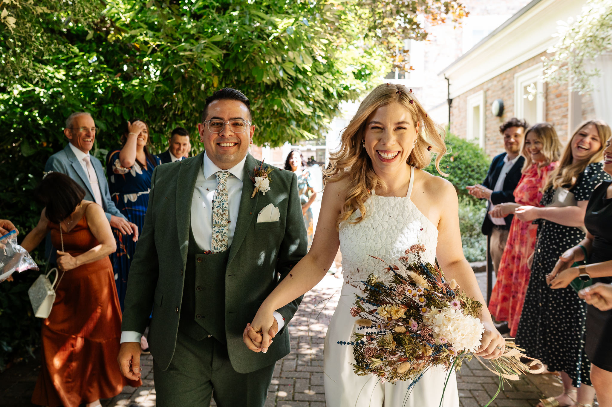 confetti shot with bride and groom and guests outside of york registry office 